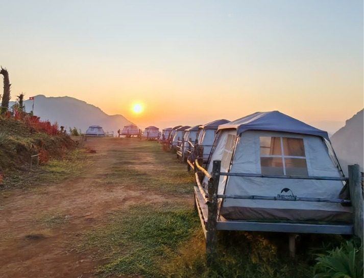 Tents on the ridge at sunset