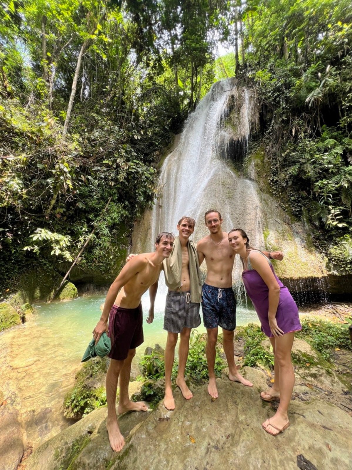 Travellers at Tad Mok waterfall